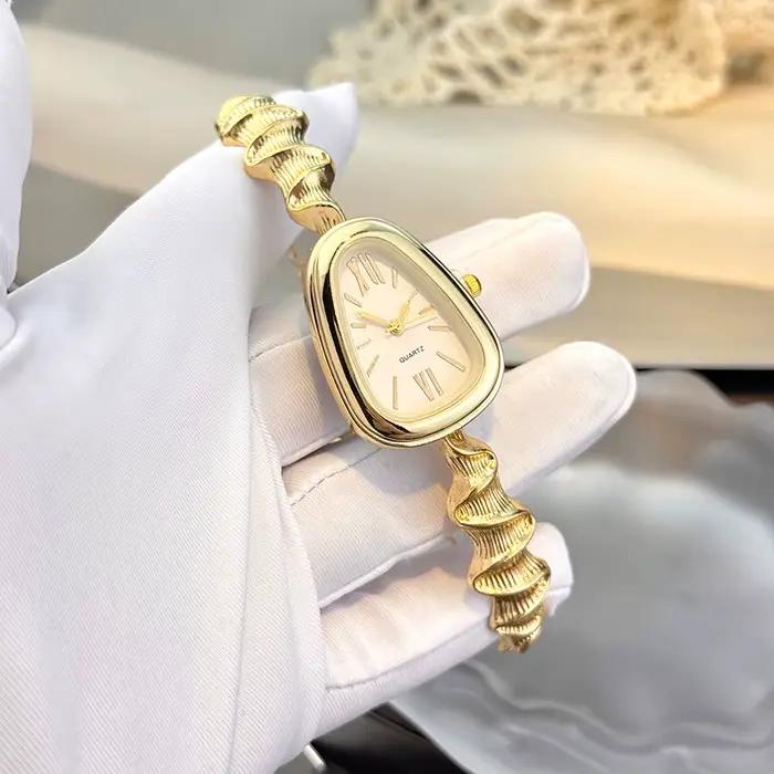 Montre à Quartz élégante en forme de serpent pour femmes, tendance, Style européen et américain, lux