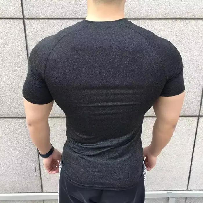 Nouveaux hommes d'été à manches courtes Fitness t-shirt course Sport Gym couleur unie séchage rapide