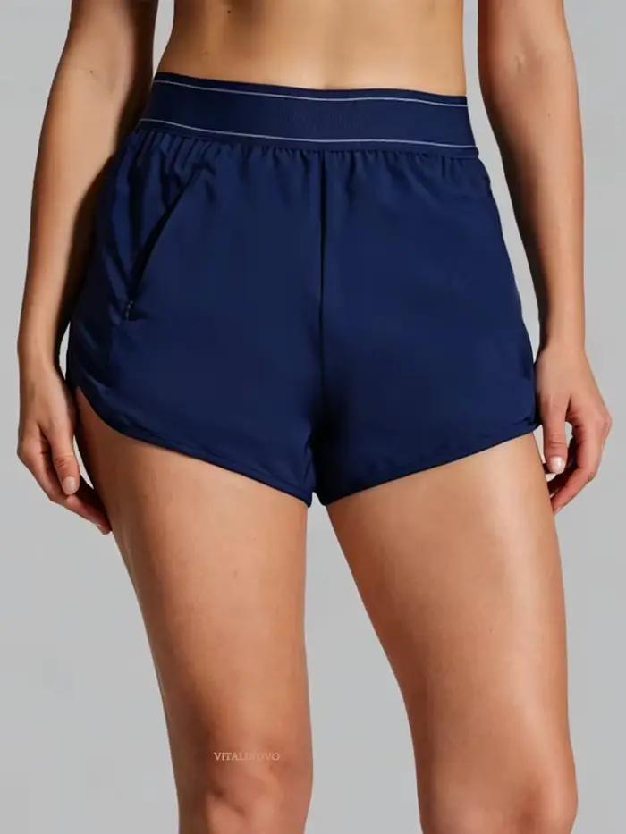 Shorts de course taille haute fendus pour femme