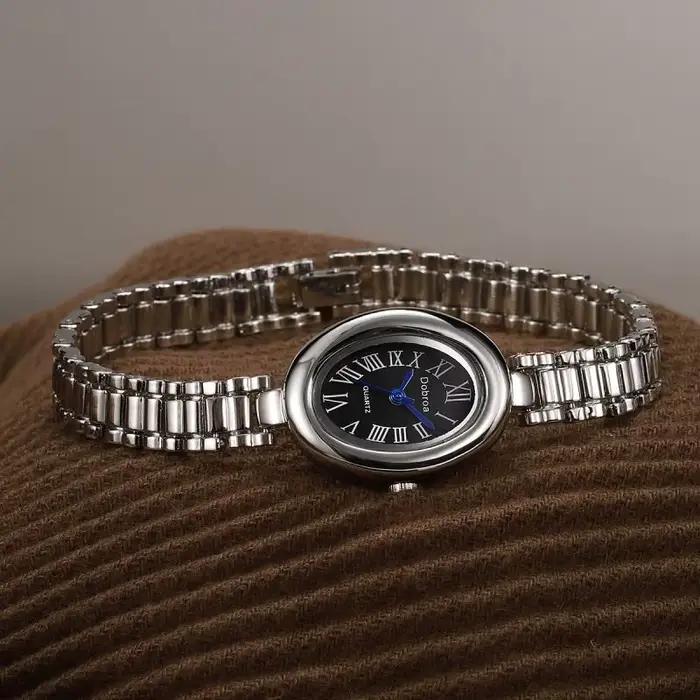 Montre pour femme ceinture en acier haute beauté ovale baignoire Simple