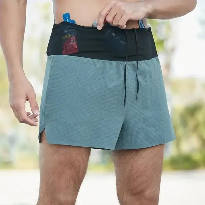 Short de Marathon 2 en 1 à doublure triangulaire pour hommes